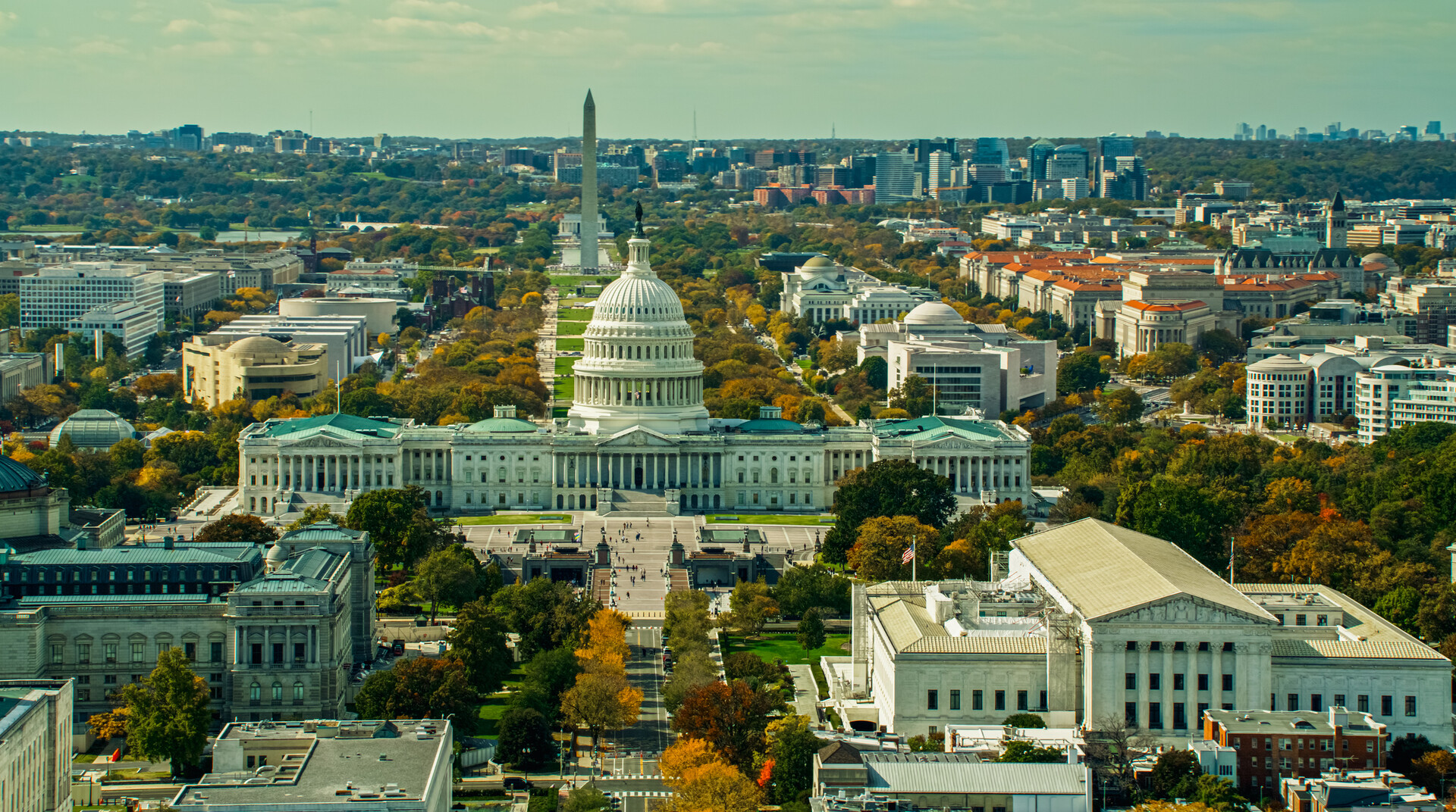 Aerial view of Washington D.C. that shows the Capitol, Supreme Court and Washington Monument