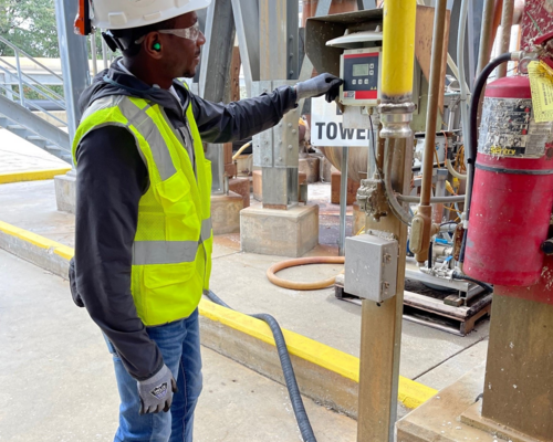 Photo of Tony Murphy working at paper mill